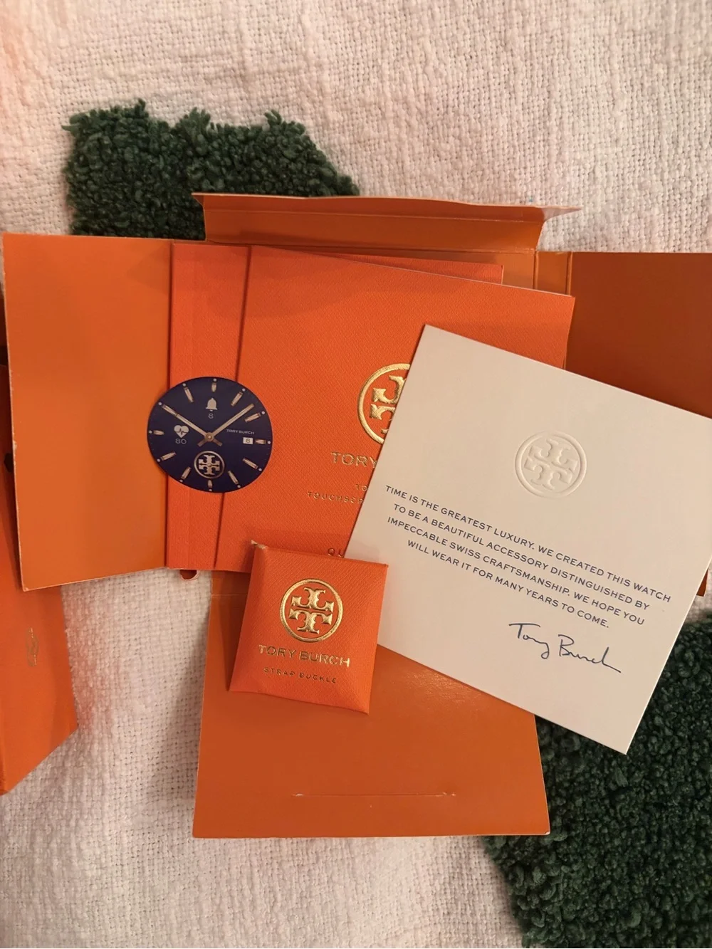 Tory Burch Navy Dial Watch with Gold Accents and Orange Packaging